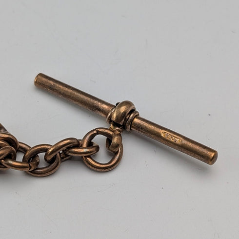 Antique British rolled gold double Albert chain with brass key fob